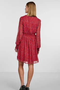 Vestido Corto De Manga Larga Y Con Estampado.